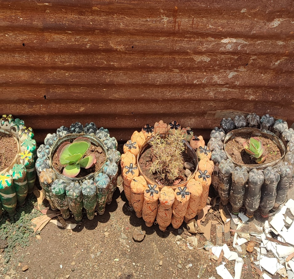 Upcycled Flower Pots by Kibarazani Youth